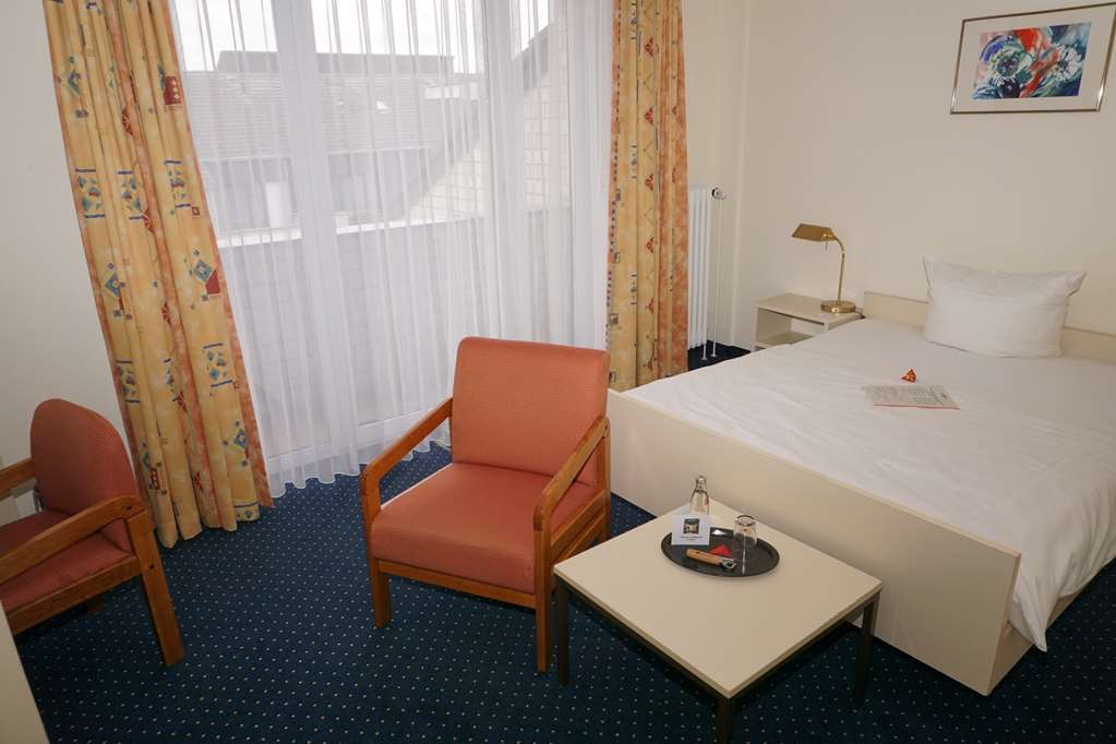 Acora Bonn Living The City Room photo